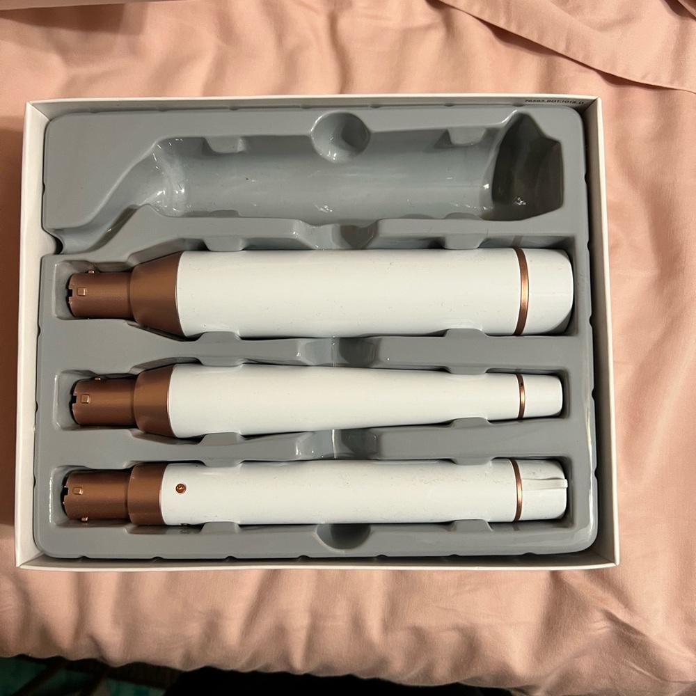 Used T3 styling wand with 3 unused barrels and one used barrels.